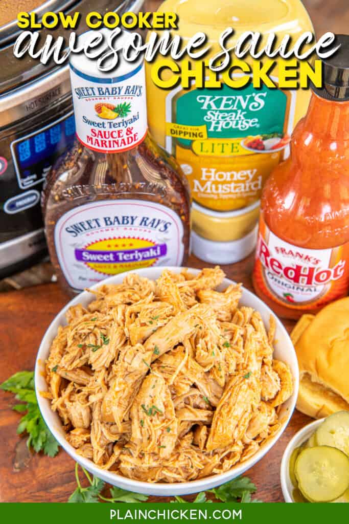 bowl of pulled chicken on a table with ingredients in the background with text overlay