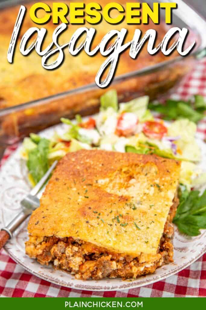 slice of crescent lasagna on a plate with salad on a red and white checked tablecloth with text overlay