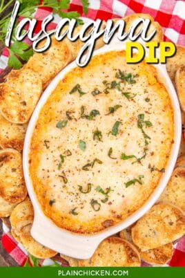 baking dish of lasagna dip surrounded by garlic toast with text overlay