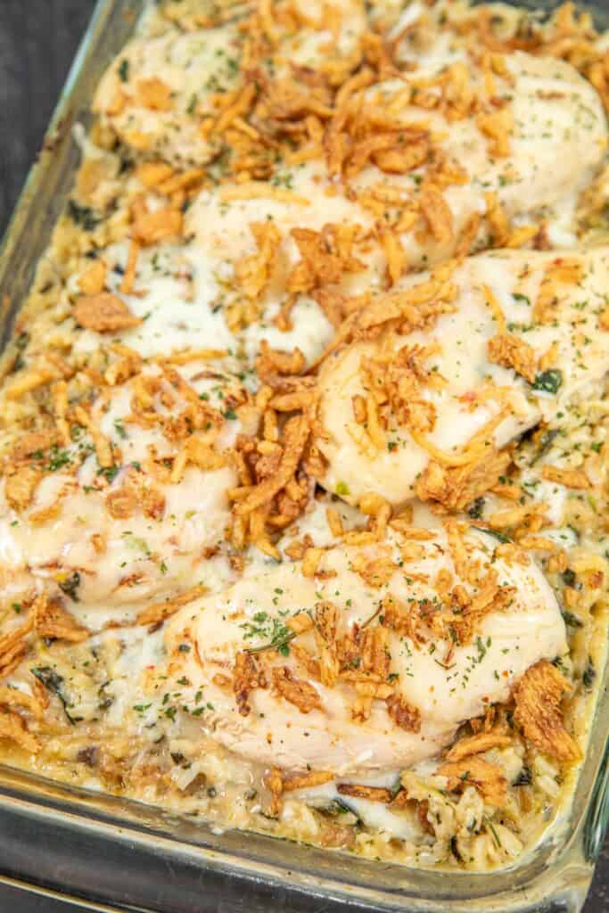 baking dish of chicken and rice topped with french fried onions