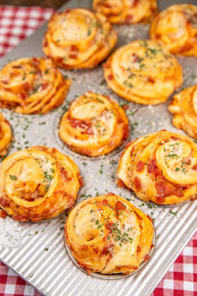 muffin pan of baked pepperoni pizza muffins
