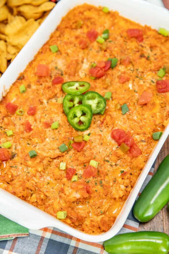 baking dish of mexican chicken dip on a table