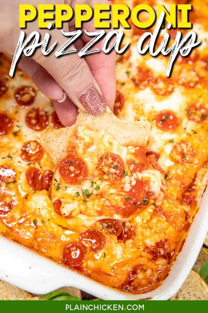 scooping pizza dip onto a slice of bread from a baking dish with text overlay