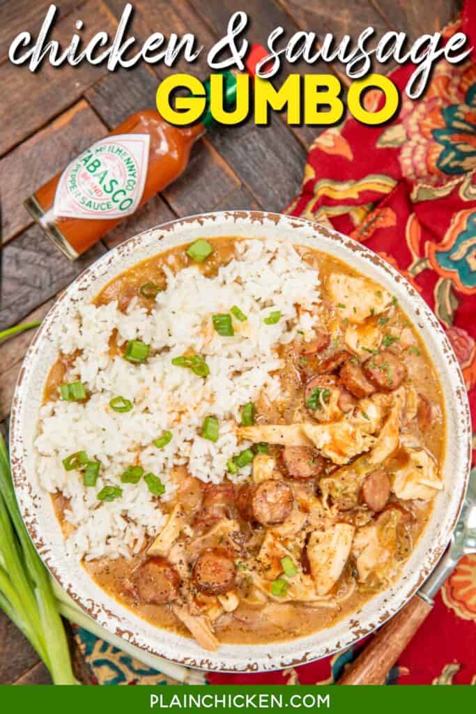 bowl of chicken & sausage gumbo topped with rice on a table with text overlay