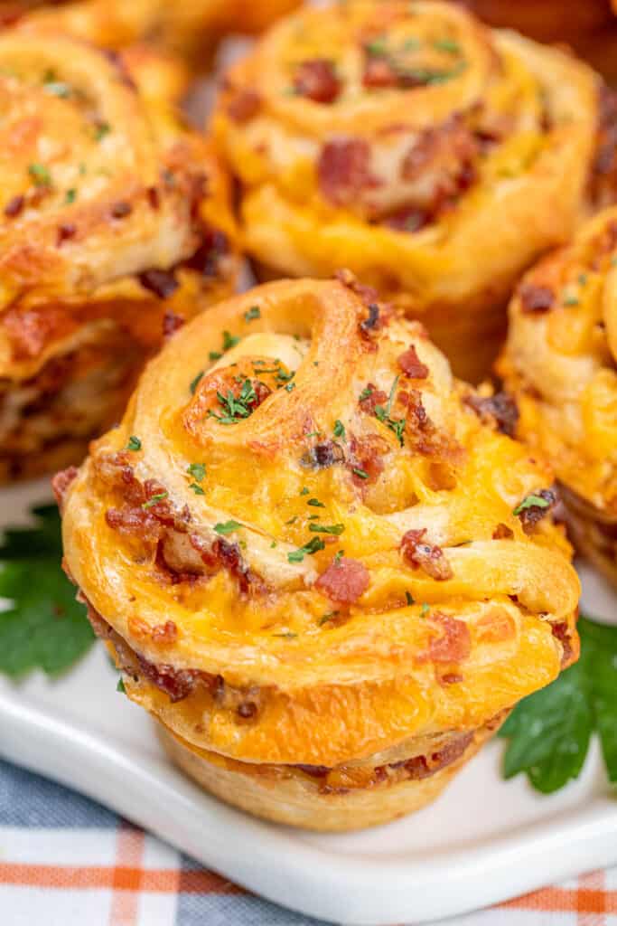 cheddar bacon ranch crescent muffins on a platter