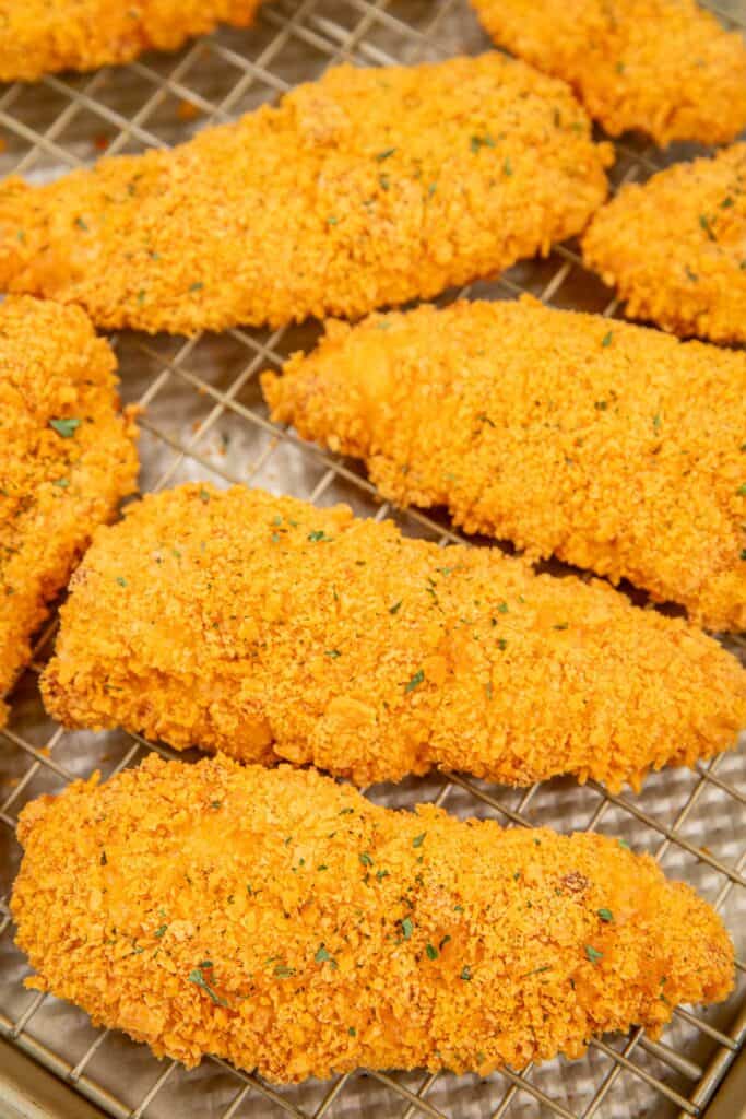 baked chicken tenders on a baking sheet