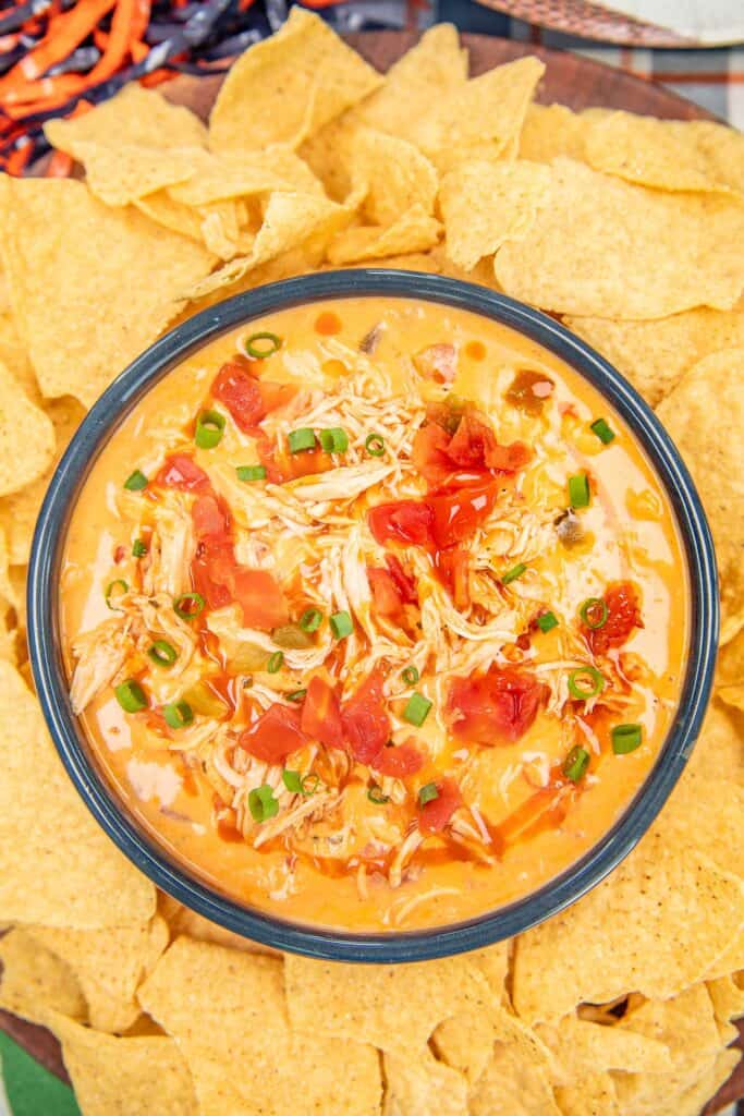bowl of buffalo chicken cheese dip surrounded by tortilla chips