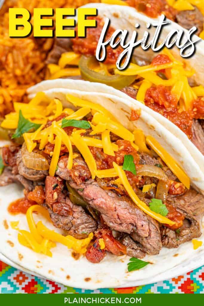 plate of steak fajitas in tortillas with text overlay