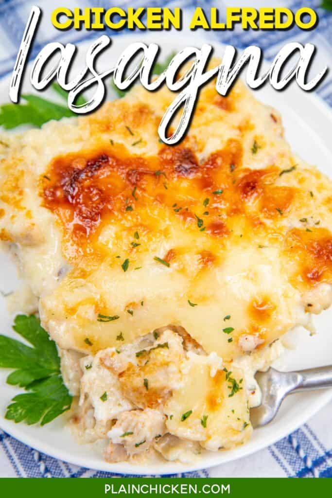 cutting into a slice of chicken alfredo lasagna on a plate with text overlay