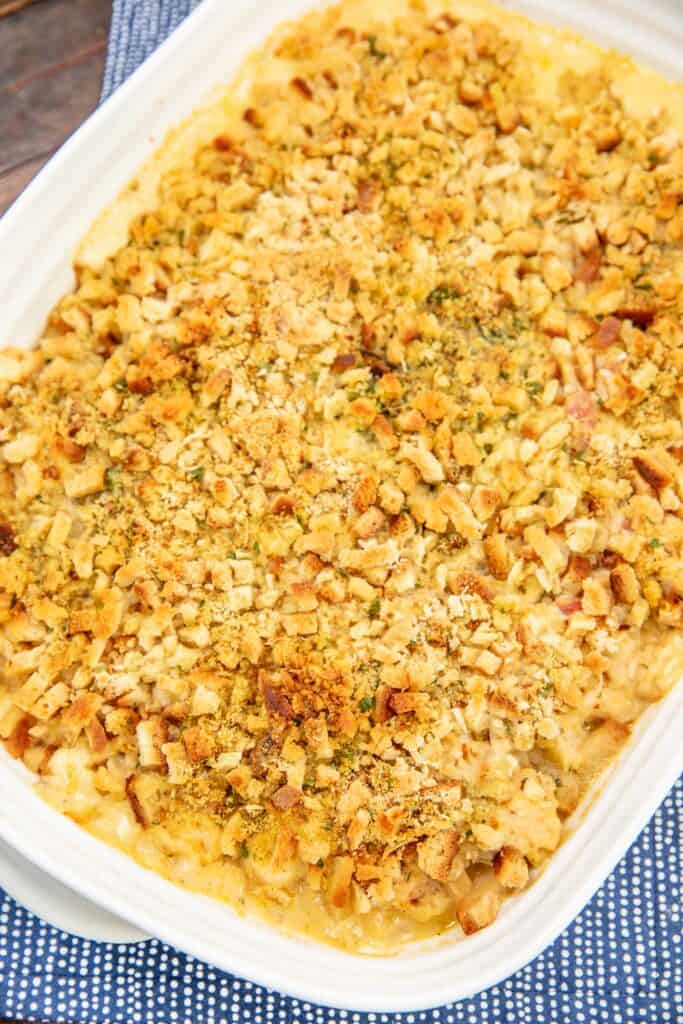 baking dish of ham and chicken stuffing casserole on a table
