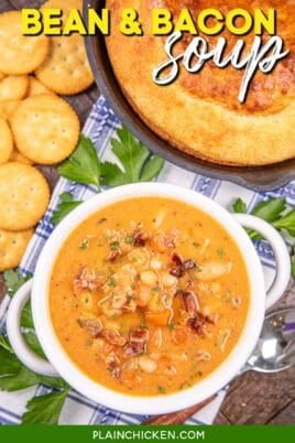 bowl of bean soup on a table with cornbread and crackers with text overlay