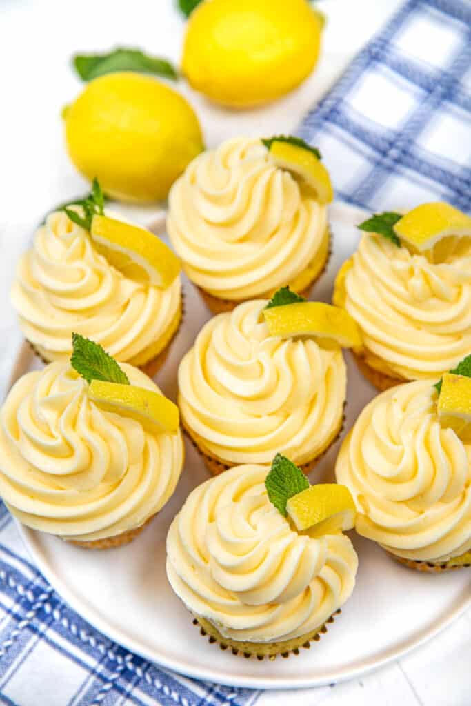 plate of lemon cupcakes on a table